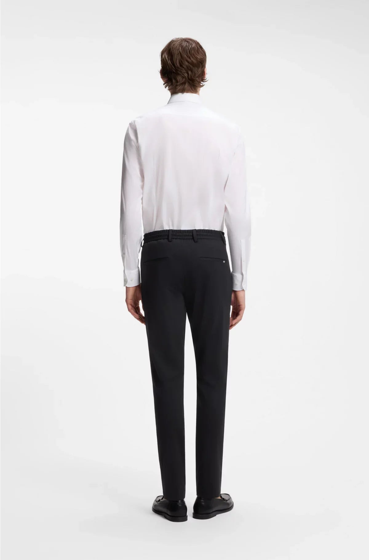 SLIM-FIT TROUSERS IN PERFORMANCE-STRETCH JERSEY