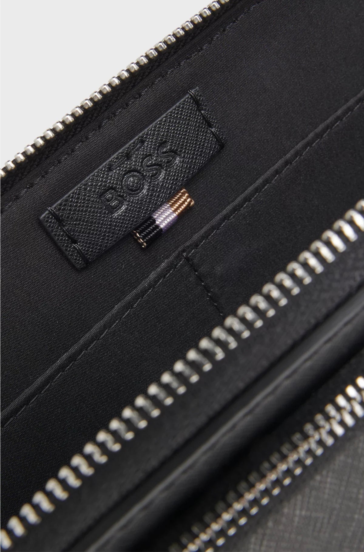 STRUCTURED CROSSBODY BAG WITH BRANDED TRIMS