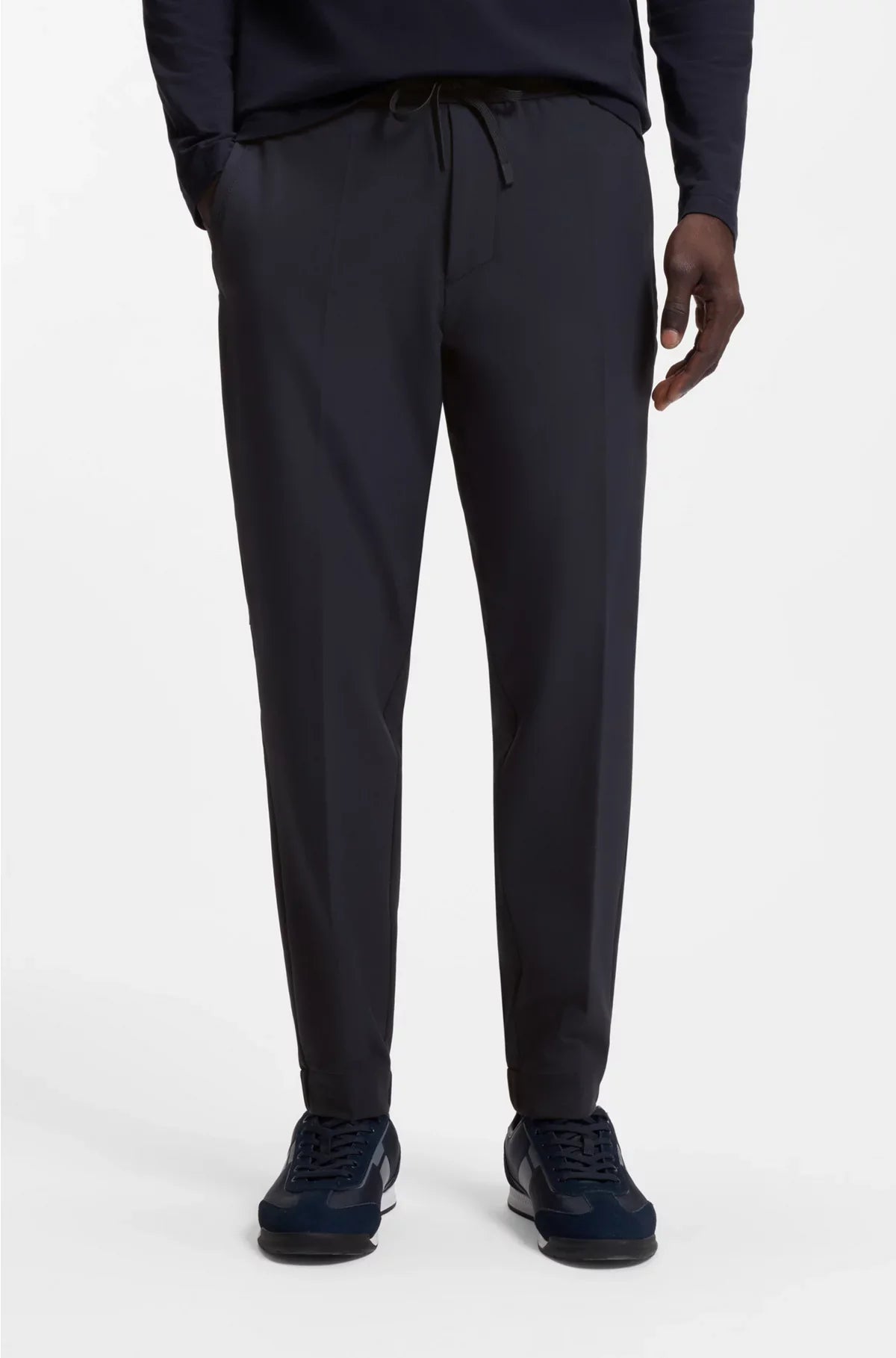 TAPERED-FIT TROUSERS IN WATER-REPELLENT STRETCH FABRIC