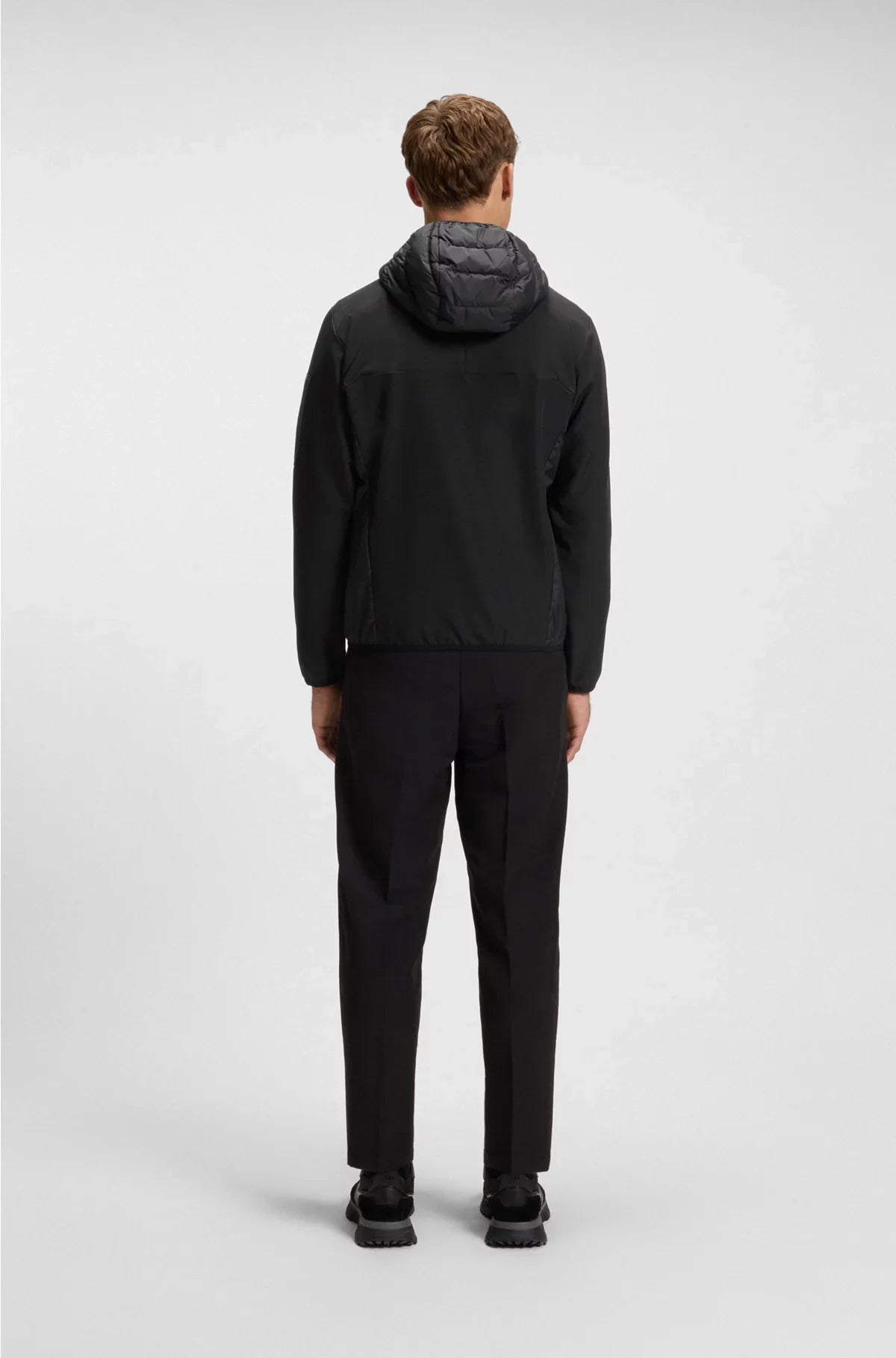 WATER-REPELLENT JACKET WITH ZIPPED SLEEVE POCKET