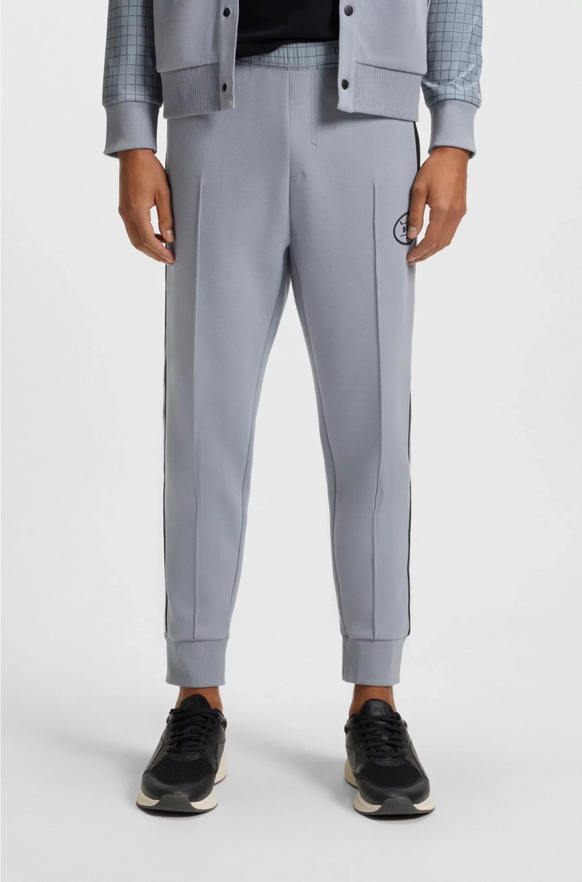 CHECK-PRINT TRACKSUIT BOTTOMS IN STRETCH PIQUE