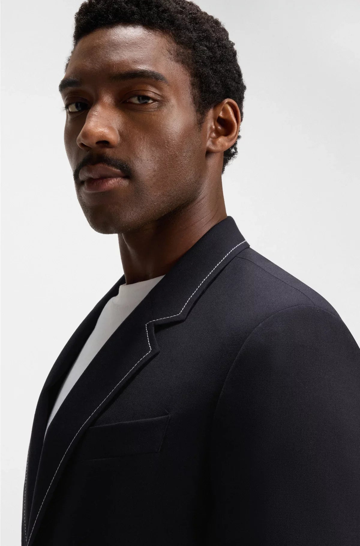 RELAXED-FIT JACKET IN VIRGIN WOOL WITH CONTRAST STITCHING