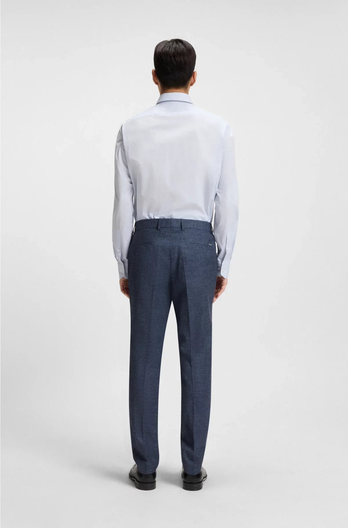 SLIM-FIT TROUSERS IN PATTERNED STRETCH FABRIC